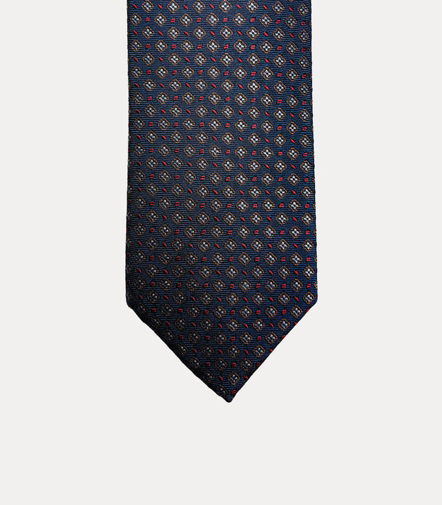 Cravatta uomo in seta 100% blu navy con microfantasia geometrica rossa e beige Fabio Toma Roma