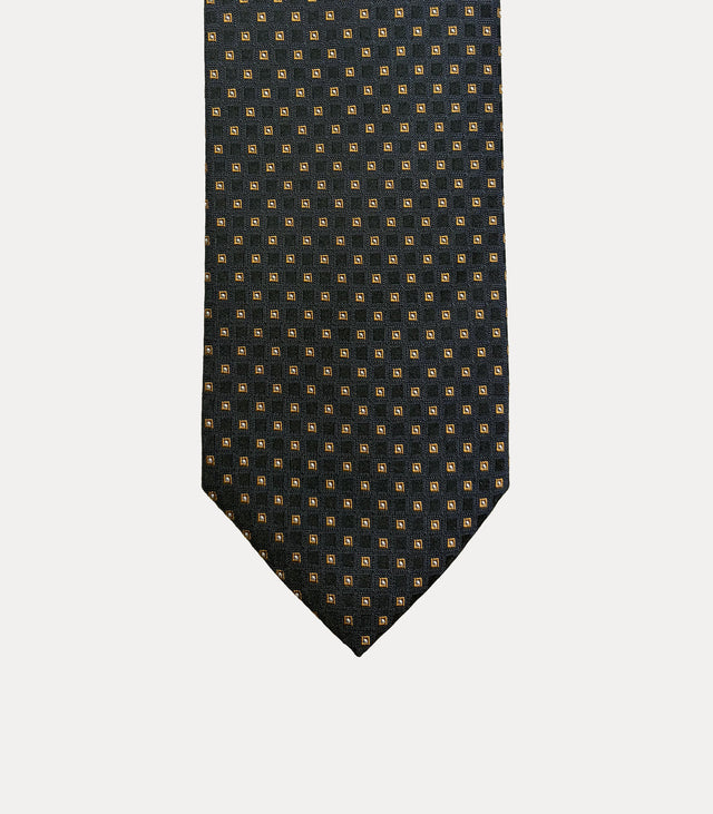 Cravatta uomo in seta 100% blu navy con microfantasia geometrica oro Fabio Toma Roma