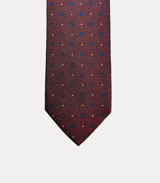 Cravatta uomo in seta 100% rosso ruggine con microfantasia blu e avorio Fabio Toma Roma