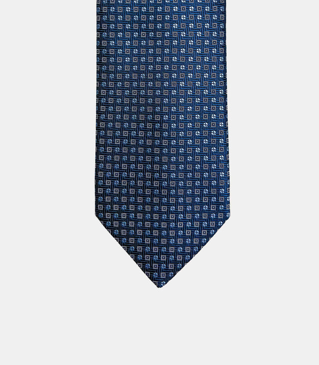 Cravatta uomo in seta 100% blu navy con microfantasia geometrica azzurra e avorio, larghezza 8 cm Fabio Toma Roma