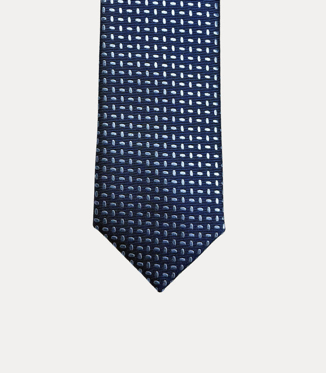 Cravatta uomo slim in seta 100% blu navy con microfantasia a trattini azzurri e larghezza 6 cm Fabio Toma Roma.