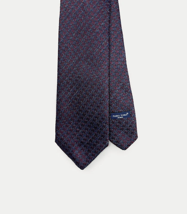 Cravatta in seta blu e bordeaux con motivo geometrico