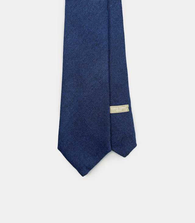 Cravatta blu in cashmere con microdisegno tono su tono