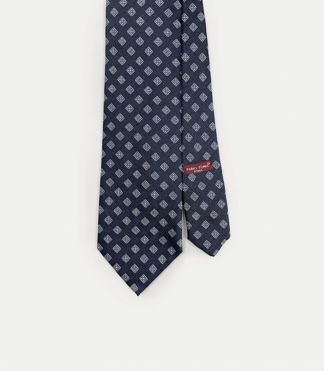 Cravatta blu navy in seta con microdisegno geometrico
