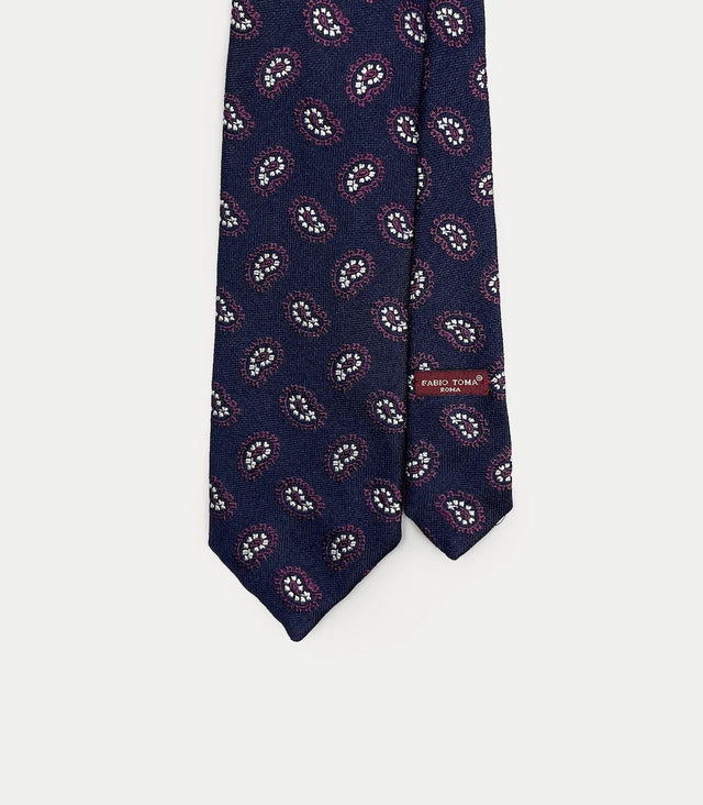 Cravatta blu navy in seta con motivo paisley rosso e bianco