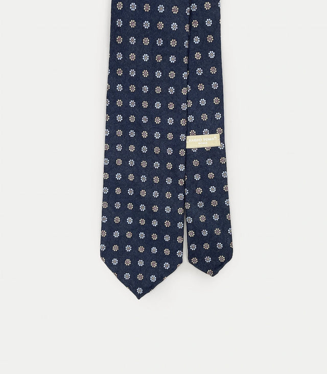 Cravatta blu notte in seta sfoderata con motivo floreale geometrico e retro paisley