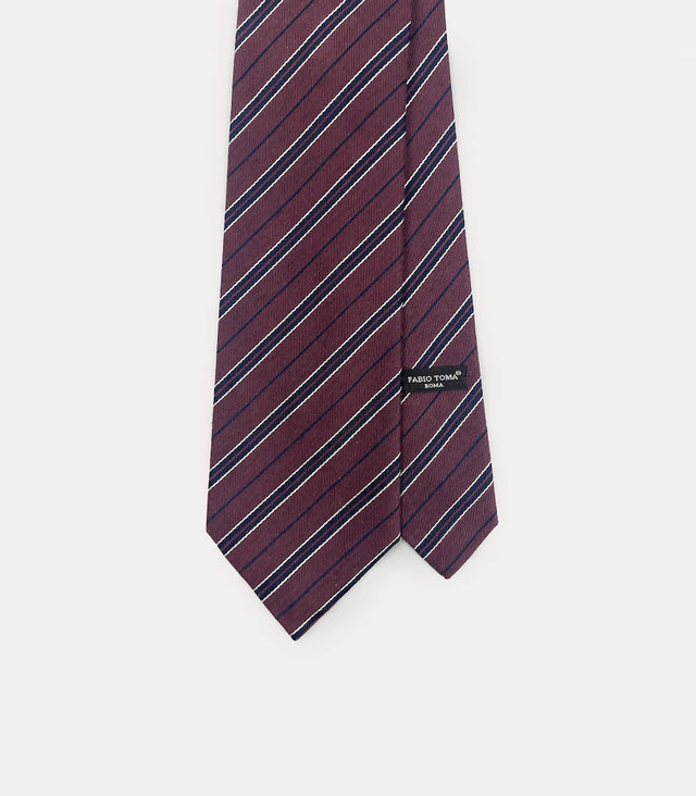 Cravatta bordeaux in seta jacquard con righe diagonali blu e bianche