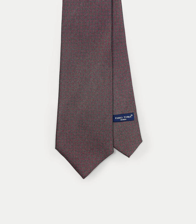Cravatta grigio scuro in seta con microfantasia rosso bordeaux
