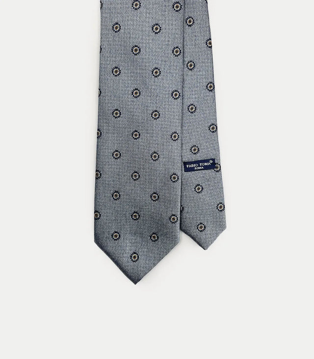 Cravatta azzurra in seta con microfantasia geometrica blu e beige