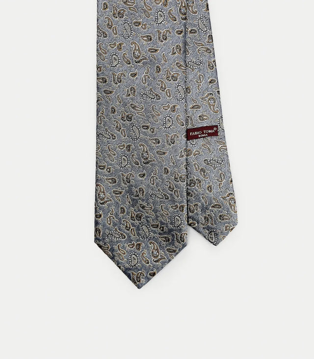 Cravatta paisley beige e marrone su fondo azzurro in seta
