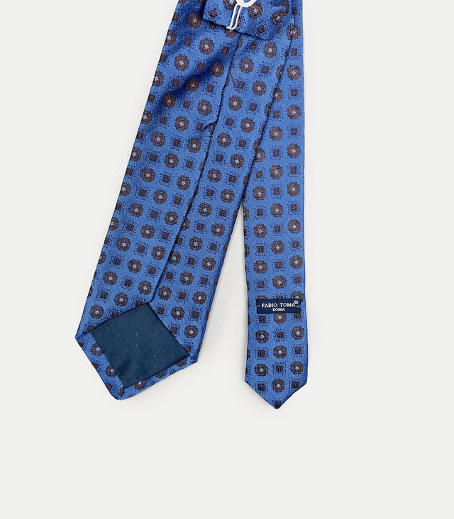 Retro cravatta blu in seta con fantasia geometrica a quadrati