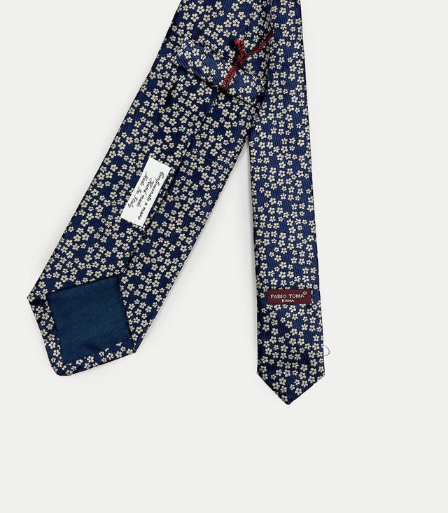Retro cravatta blu navy in seta jacquard con pattern floreale