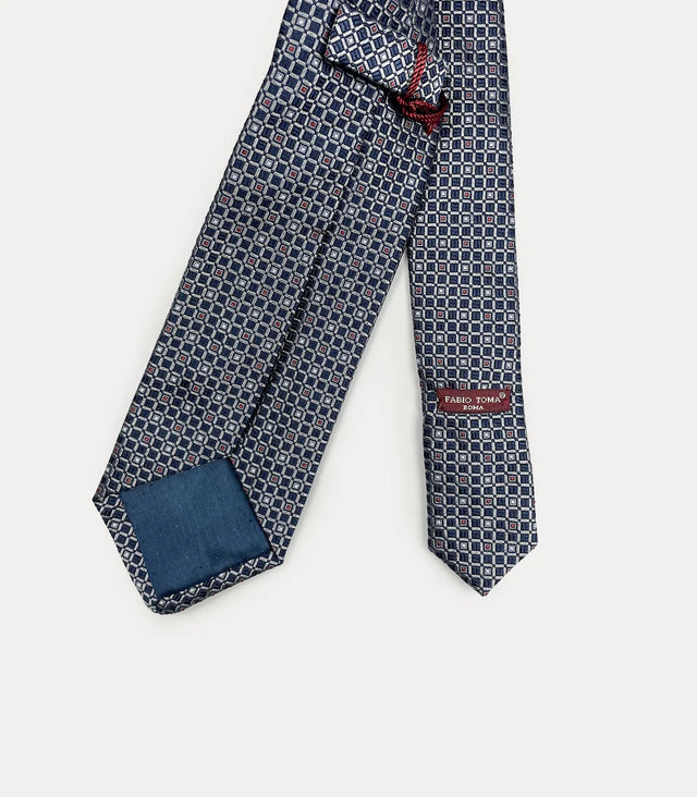 Retro cravatta blu navy in seta con disegno geometrico a quadri