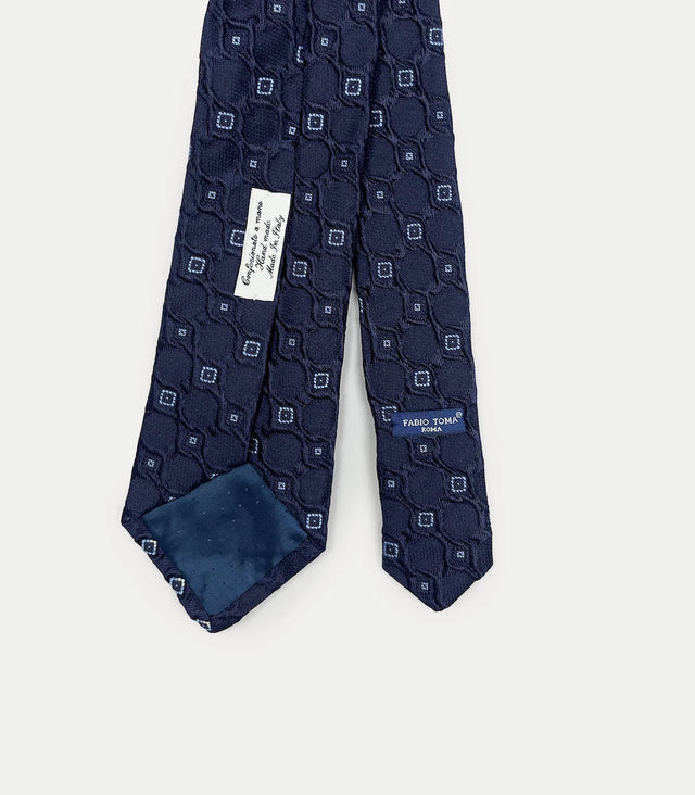 Retro cravatta blu scuro in seta con pattern a rilievo