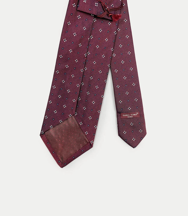 Retro cravatta bordeaux con microdisegni bianchi e blu in seta