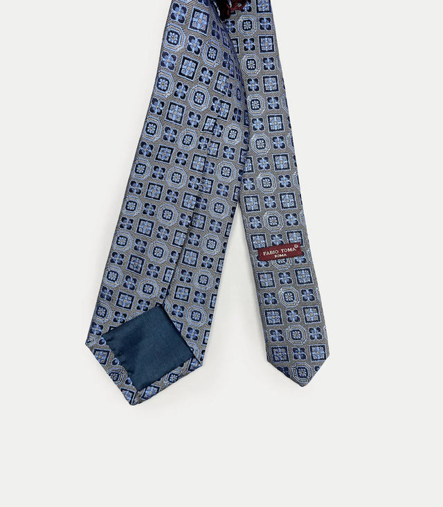 Retro cravatta grigio perla con disegni geometrici in seta