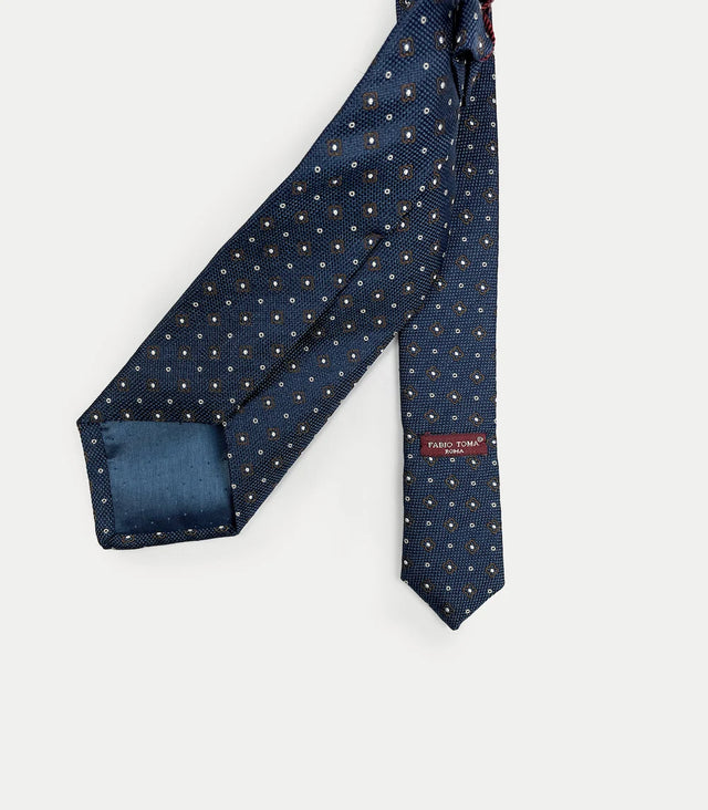 Retro cravatta seta blu con micro-motivo ocra e bianco