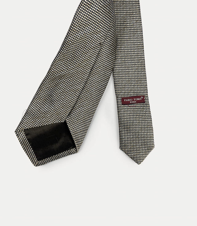 Retro cravatta nera con microfantasia beige in seta