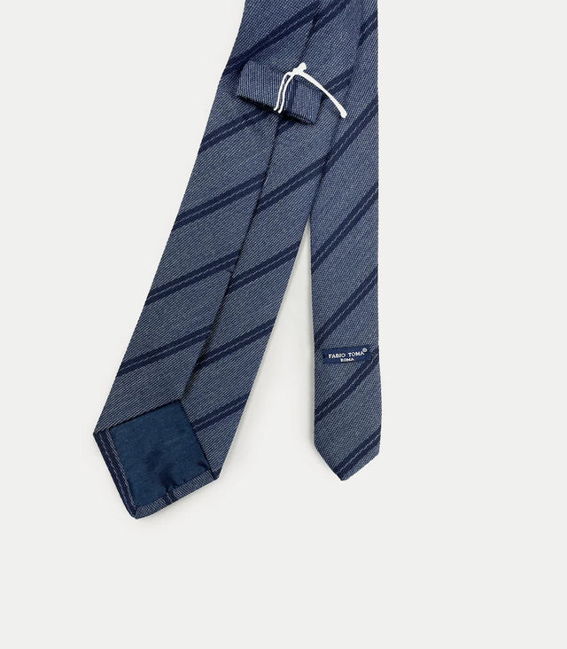 Retro cravatta seta azzurra con righe blu diagonali