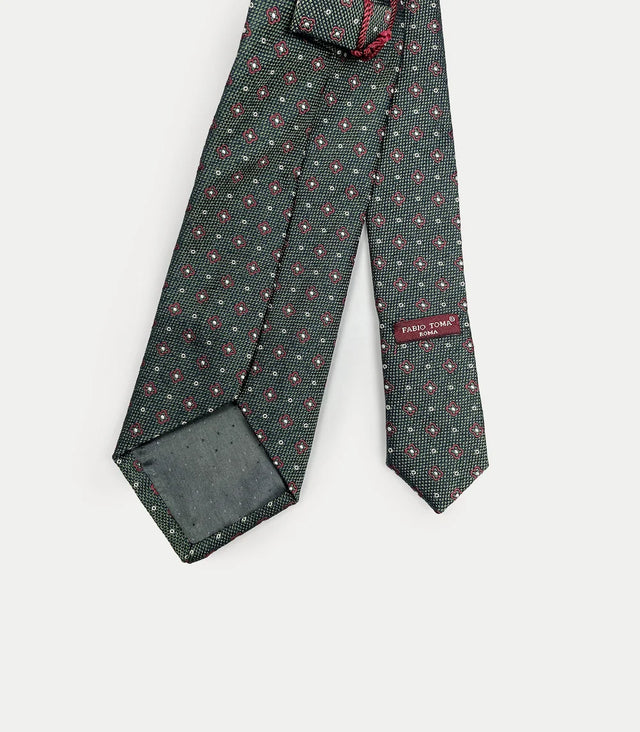 Retro cravatta verde in seta con disegno geometrico rosso e bianco
