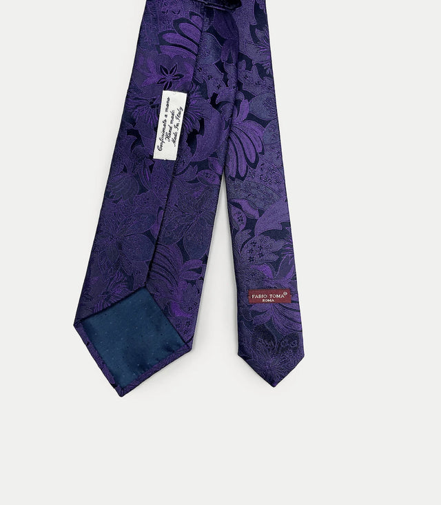 Retro cravatta in seta viola e blu notte con disegno floreale a rilievo